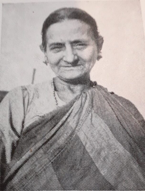 A black and white portrait of Nana Millie's mother in a sari